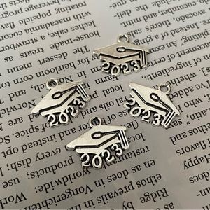 NWT 4 pieces silver 2023 graduation 👩‍🎓charms
